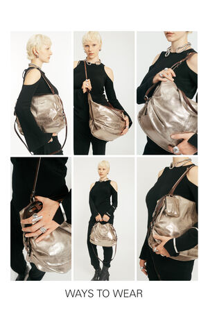 6 Tragevarianten von großer goldener Metallic Handtasche