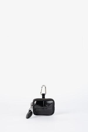 A small, black, glossy INA KENT zippered case with a silver clasp and a leaf-shaped keychain attachment, displayed against a plain white background.