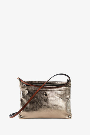 A metallic gold INA KENT leather crossbody bag with a front zipper pocket, small round charm, and adjustable brown strap.