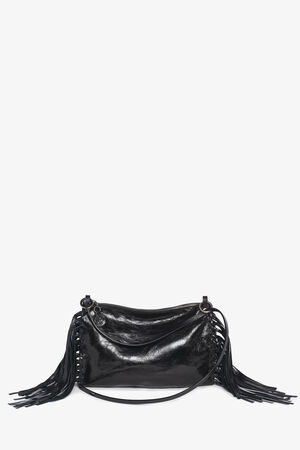 A shiny black INA KENT leather shoulder bag with a top zipper, side tassel details, and a long strap, displayed against a plain white background.