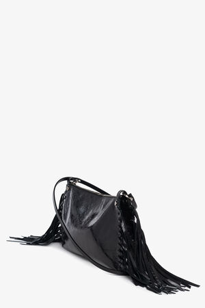 A black leather shoulder bag by INA KENT with a shiny finish and long fringe details on both sides, shown against a plain white background.