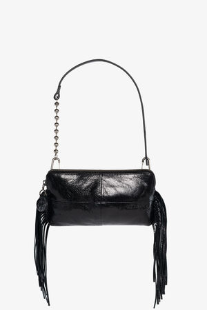 An INA KENT black leather handbag with a short shoulder strap, metal bead detail, and long fringe accents on both sides is displayed against a white background.