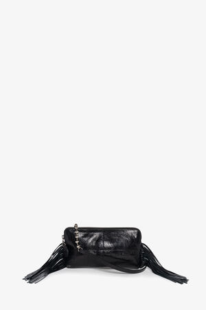 An INA KENT black leather crossbody bag with side tassels, a zipper closure, and a chain strap, displayed against a plain white background.