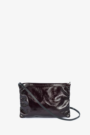 A small, black, shiny INA KENT leather crossbody bag with a long strap and gathered sides, set against a plain white background.