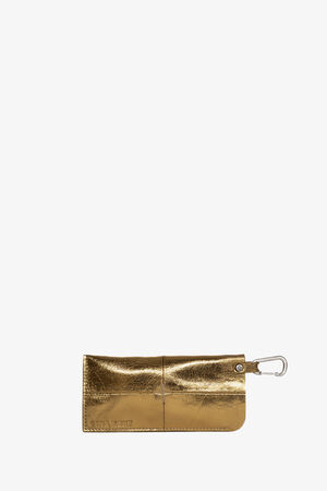 A metallic gold leather pouch by INA KENT featuring a flap closure and a silver carabiner clip attached to one end.