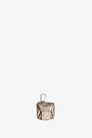 A small metallic leather pouch by INA KENT, featuring a flap closure and a carabiner clip attached to the top, displayed against a plain white background.