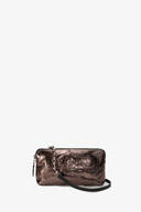 The INA KENT metallic brown clutch features a sleek zipper, elegant chain, and stylish black strap, set against a plain background.