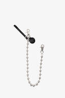A silver beaded chain with lobster clasp hooks at both ends, a black leather INA KENT tag, and a round black textured charm attached to one clasp.