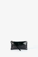 A small black leather INA KENT wristlet clutch with a zipper closure and a wrist strap, displayed against a plain white background.