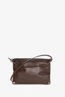 An INA KENT brown leather crossbody bag with a zipper closure and a thin strap, displayed against a plain white background.
