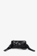 Black leather INA KENT shoulder bag with side fringe tassels, a crossbody strap, and metallic star charms on the zipper pull, displayed against a plain white background.