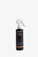 A black spray bottle labeled "Furniture Clinic Suede Protector" with a white trigger nozzle, standing upright against a plain white background—perfect for protecting INA KENT accessories.